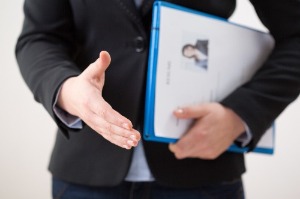 man holding hand out interview preparation