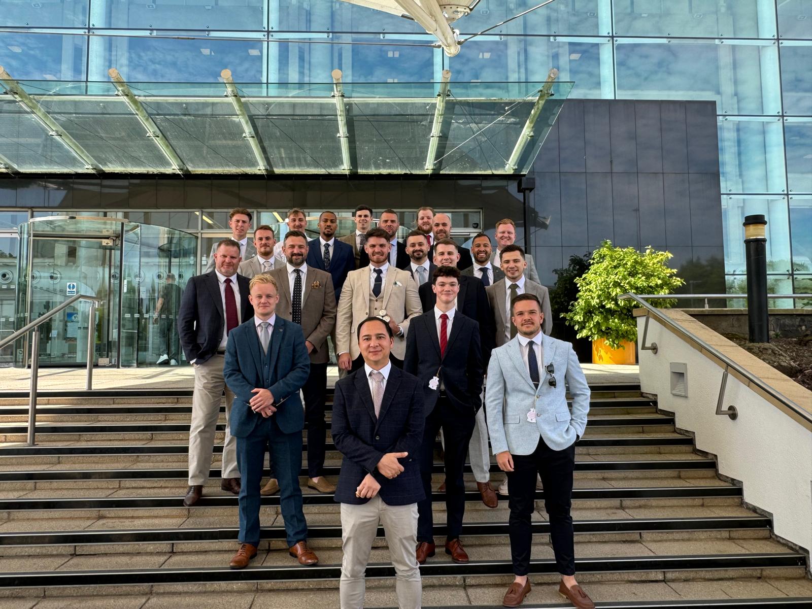 Carrington West male staff members dressed up and ready to go to Goodwood Festival of Speed in 2024