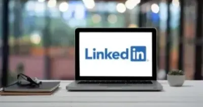 Laptop with LinkedIn on the screen, showing our expertise in personal LinkedIn branding