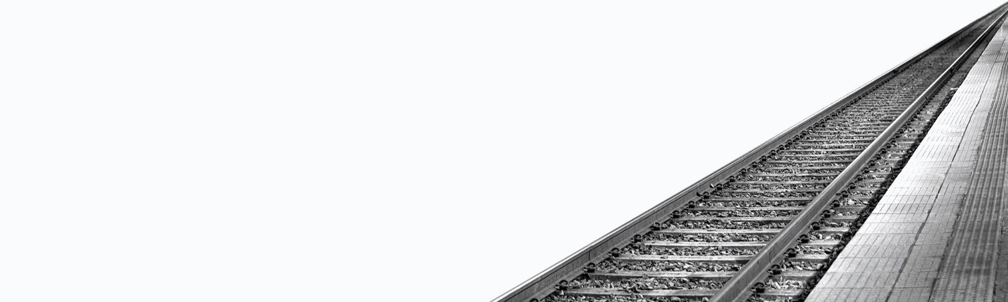 Banner image of a railway line and tracks with a white background